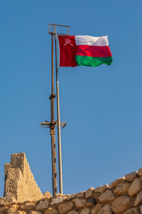 Picture of MIDDLE EAST-ARABIAN PENINSULA-OMAN-MUSCAT-MUTTRAH-OMANI FLAG FLYING IN MUTTRAH