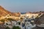Picture of MIDDLE EAST-ARABIAN PENINSULA-OMAN-MUSCAT-SUNSET VIEW OF A NEIGHBORHOOD IN THE HILLS OF MUSCAT