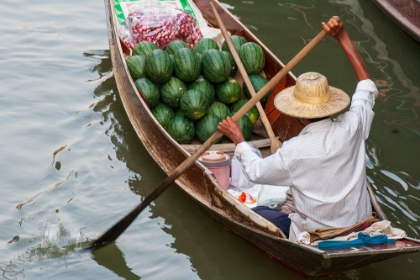 Picture of DAMNOEN SADUAK FLOATING MARKET-BANGKOK-THAILAND-MAN WITH A BOATLOAD OF WATERMELONS FOR SALE