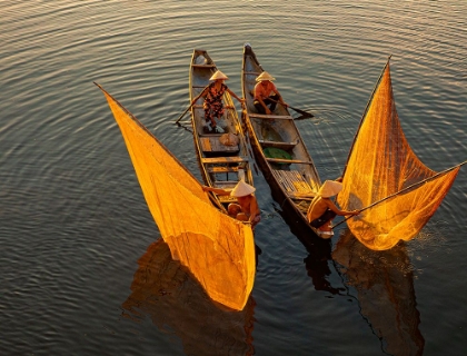 Picture of VIETNAM-COORDINATED LAGOON FISHING WITH NETS AT SUNSET
