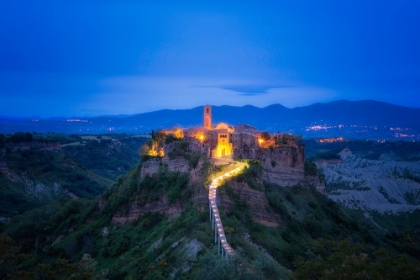 Picture of EUROPE-ITALY-CIVITA DI BAGNOREGIO-MEDIEVAL HILLTOP TOWN LIT AT SUNSET