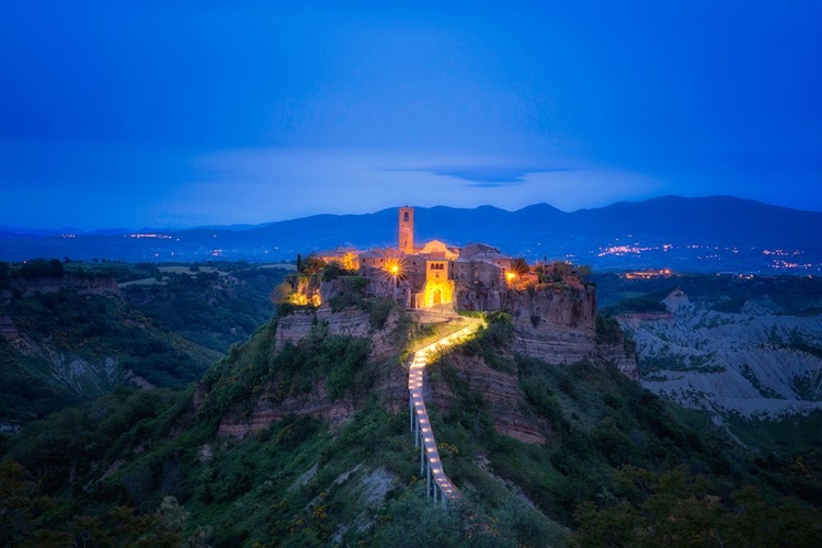 Picture of EUROPE-ITALY-CIVITA DI BAGNOREGIO-MEDIEVAL HILLTOP TOWN LIT AT SUNSET