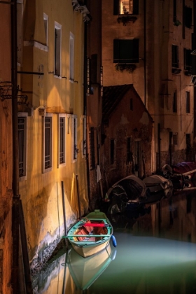 Picture of EUROPE-ITALY-VENICE-WOODEN BOAT AND REFLECTIONS ON STILL CANAL AT NIGHT