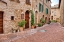 Picture of ITALY-TUSCANY-PIENZA FLOWER POTS AND POTTED PLANTS DECORATE A NARROW STREET IN A TUSCANY VILLAGE