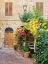 Picture of ITALY-TUSCANY-PIENZA DOORWAY SURROUNDED BY FLOWERS