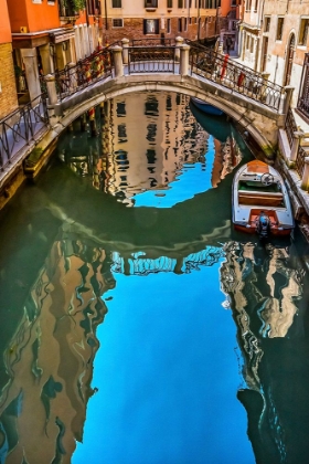 Picture of COLORFUL SMALL CANAL AND BRIDGE CREATES BEAUTIFUL REFLECTIONS IN VENICE-ITALY