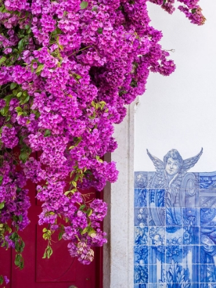 Picture of PORTUGAL-LISBON-PINK FLOWERS OF BOUGAINVILLEA PLANT AND HISTORICAL BUILDING NEXT TO MIRADOURO DE SA