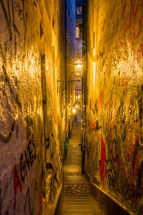 Picture of SWEDEN-STOCKHOLM-GAMLA STAN-OLD TOWN-MARTEN TROTZIGS GRAND-NARROWEST STREET IN STOCKHOLM-EVENING