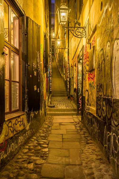Picture of SWEDEN-STOCKHOLM-GAMLA STAN-OLD TOWN-MARTEN TROTZIGS GRAND-NARROWEST STREET IN STOCKHOLM-EVENING