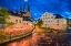 Picture of SWEDEN-CENTRAL SWEDEN-UPPSALA-DOMKYRKA CATHEDRAL WITH RIVERFRONT CAFE-DUSK