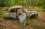 Picture of SWEDEN-SMALAND-RYD-KYRKO MOSSE CAR CEMETERY-FORMER JUNKYARD NOW PUBIC PARK-JUNKED CARS