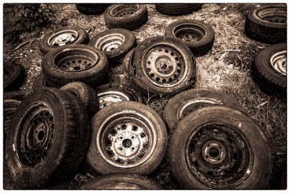 Picture of SWEDEN-SMALAND-RYD-KYRKO MOSSE CAR CEMETERY-FORMER JUNKYARD NOW PUBIC PARK-OLD TIRES