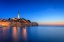 Picture of EUROPE-CROATIA-ROVINJ-OCEAN VIEW OF TOWN AT SUNSET