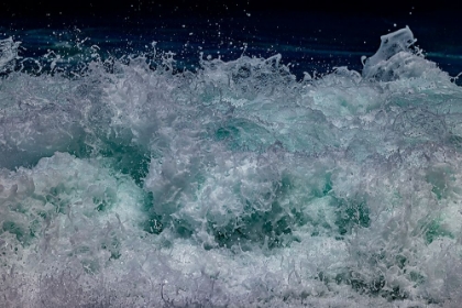 Picture of WAVES FOAMING AND BUBBLING WHEN THEY HAMMER THE SANDY BEACH AT SUNSET BEACH