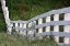 Picture of WHITE WOODEN FENCE ACROSS ROLLING HILL-SHAKER VILLAGE OF PLEASANT HILL-HARRODSBURG-KENTUCKY