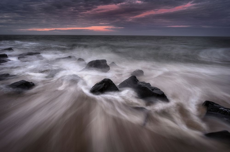 Picture of USA-NEW JERSEY-CAPE MAY NATIONAL SEASHORE-SUNRISE ON ROCKY SHORE AND OCEAN