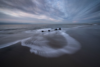 Picture of USA-NEW JERSEY-CAPE MAY NATIONAL SEASHORE PIER STUMPS ON CLOUDY SEASHORE SUNRISE