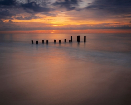 Picture of USA-NEW JERSEY-CAPE MAY NATIONAL SEASHORE SUNRISE ON PIER POSTS ON OCEAN SHORE