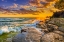 Picture of USA-NEW YORK-LAKE ONTARIO SUNSET WAVES ON ROCKY SHORELINE