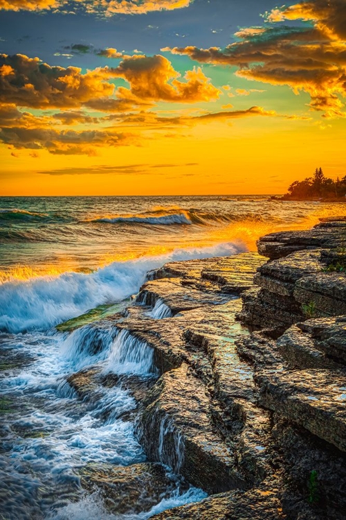 Picture of USA-NEW YORK-LAKE ONTARIO SUNSET WAVES ON ROCKY SHORELINE