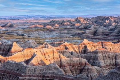 Picture of FORMATIONS OF STRIATED HOODOO LEAD THE EYE TO A PLATEAU AND MORE PEAKS