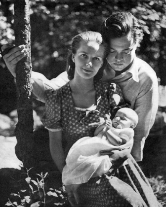 Picture of ORSON WELLES, VIRGINIA NICOLSON WELLES WITH THEIR BABY DAUGHTER