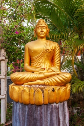 Picture of LAOS- LUANG PRABANG. GOLDEN BUDDHA STATUE WITH ELONGATED EARLOBES.