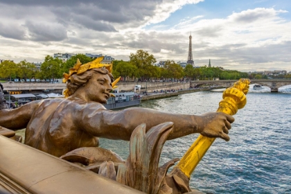 Picture of PARIS. NYMPHES DE LA SEINE STATUE ON PONT ALEXANDRE III- ALONG RIVER SEINE. DISTANT EIFFEL TOWER.