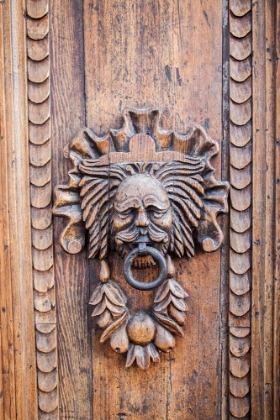 Picture of ITALY- UMBRIA- ASSISI. ORNATE WOOD CARVED DOOR KNOCKER.