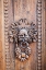 Picture of ITALY- UMBRIA- ASSISI. ORNATE WOOD CARVED DOOR KNOCKER.