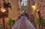 Picture of ITALY- UMBRIA. STREET LINED WITH FLOWER POTS IN THE TOWN OF ASSISI.