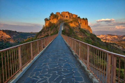 Picture of ITALY- TUSCANY. EVENING LIGHT OF CIVITA DI BAGNOREGIO AND THE LONG BRIDGE LEADING TO TOWN.