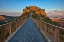 Picture of ITALY- TUSCANY. EVENING LIGHT OF CIVITA DI BAGNOREGIO AND THE LONG BRIDGE LEADING TO TOWN.