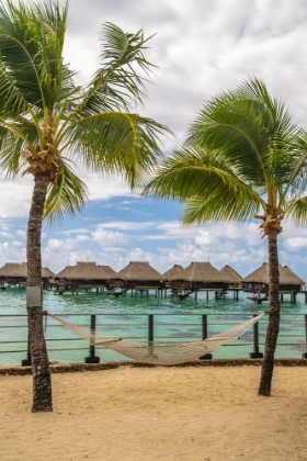 Picture of FRENCH POLYNESIA- MOOREA. OVERWATER BUNGALOWS AND HAMMOCK.