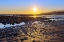 Picture of ALASKA- HOMER SPIT. A SUNSET LANDSCAPE OVER TIDE POOLS.