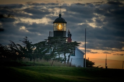 Picture of POINT PINOS SHINES ITS LIGHT AT SUNSET.