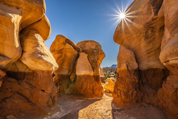 Picture of USA- UTAH- DEVILS GARDEN OUTSTANDING NATURAL AREA. SUN STARBURST ON HOODOO ROCK FORMATIONS.