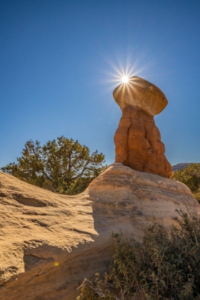 Picture of USA- UTAH- DEVILS GARDEN OUTSTANDING NATURAL AREA. SUN STARBURST ON HOODOO ROCK FORMATIONS.