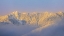 Picture of USA- WASHINGTON STATE. SUNRISE ON SNOW-COVERED MOUNTAINS IN OLYMPIC NATIONAL FOREST.