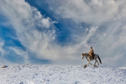 Picture of USA- SHELL- WYOMING. HIDEOUT RANCH COWGIRL ON HORSEBACK RIDING ON RIDGELINE SNOW. 