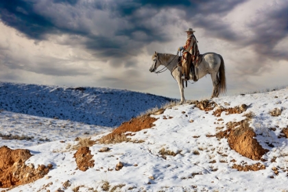 Picture of USA- SHELL- WYOMING. HIDEOUT RANCH COWGIRL ON HORSEBACK RIDING ON RIDGELINE SNOW. 