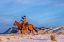 Picture of USA- WYOMING. HIDEOUT HORSE RANCH- WRANGLER AND HORSE IN SNOW. 