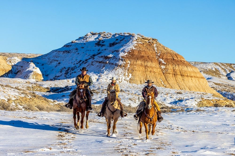 Picture of USA- WYOMING. HIDEOUT HORSE RANCH- WRANGLERS AND HORSES IN SNOW. 