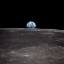 Picture of EARTH RISING OVER THE MOON FROM APOLLO 11