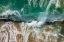 Picture of WAVE CRASHING ON A SANDY BEACH