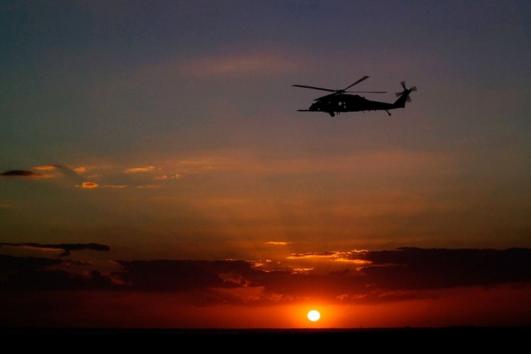 Picture of A HELICOPTER OVER THE KENNEDY SPACE CENTER