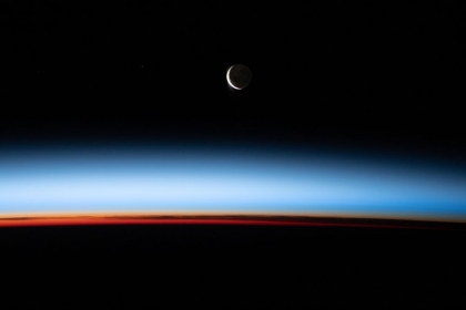 Picture of A WAXING CRESCENT MOON PICTURED FROM THE ISS