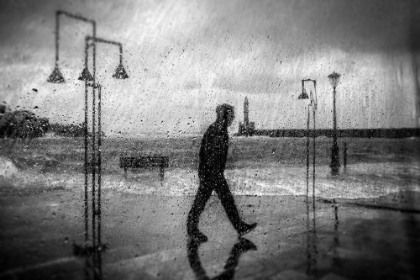 Picture of THE MAN WHO WALKED AT THE OLD HARBOR ON A LONG STORMY DAY