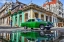 Picture of UNDER A WORNED GREEN CAR