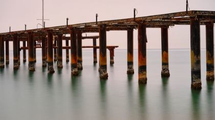 Picture of OLD PIER ON THE BEACH AND LONG EXPOSURE SEA WAVES